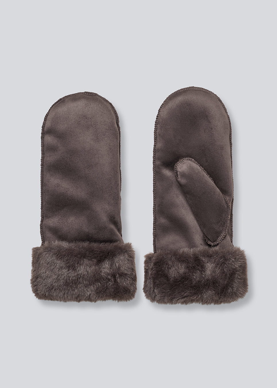Vanter i blødt imiteret ruskindsmateriale med faux fur detaljer. 