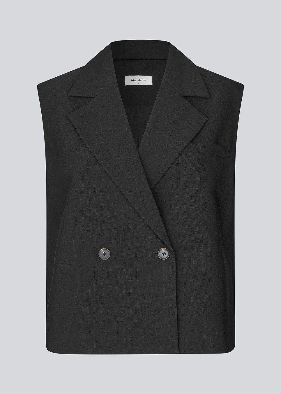 Løs vest med krave i vores klassiske gale materiale. Galemd vest er ærmeløs og har en knappelukning fortil. Modellen er 175 cm og har en str. S/36 på.