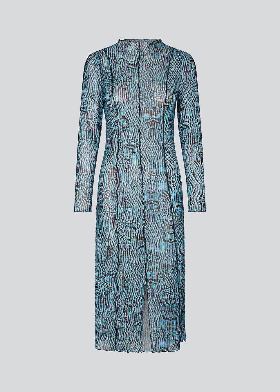 Kjole i mesh med høj hals, lange ærmer og midi længde. GwenMD print dress har dekorative bølgekanter på krop, hals og ærmer. Kjolen har slids foran og er en smule transparent. Modellen er 175 cm og har en størrelse S/36 på.
