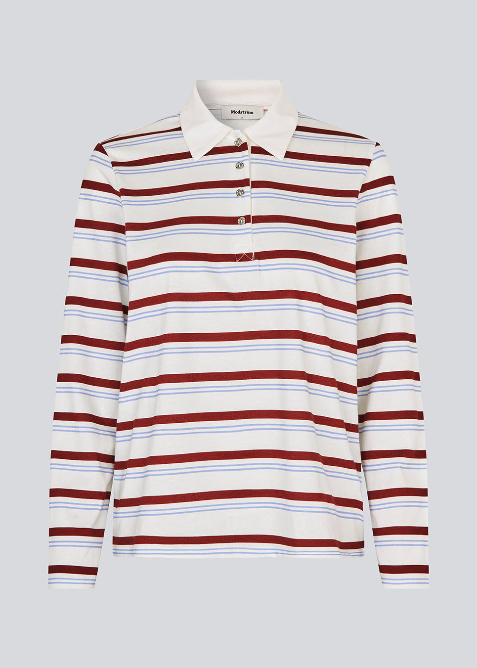 Langærmet t-shirt i bomuldsjersey med striber. HellenMD LS stripe t-shirt har en afslappet pasform med brede ærmer og rund hals. Modellen er 175 cm og har en størrelse S/36 på.