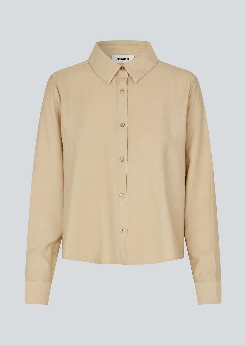 Skjorte i beige i en let EcoVero viskose med løs pasform. HudgesMD shirt har krave og knaplukning fortil og lange ærmer med manchet. 