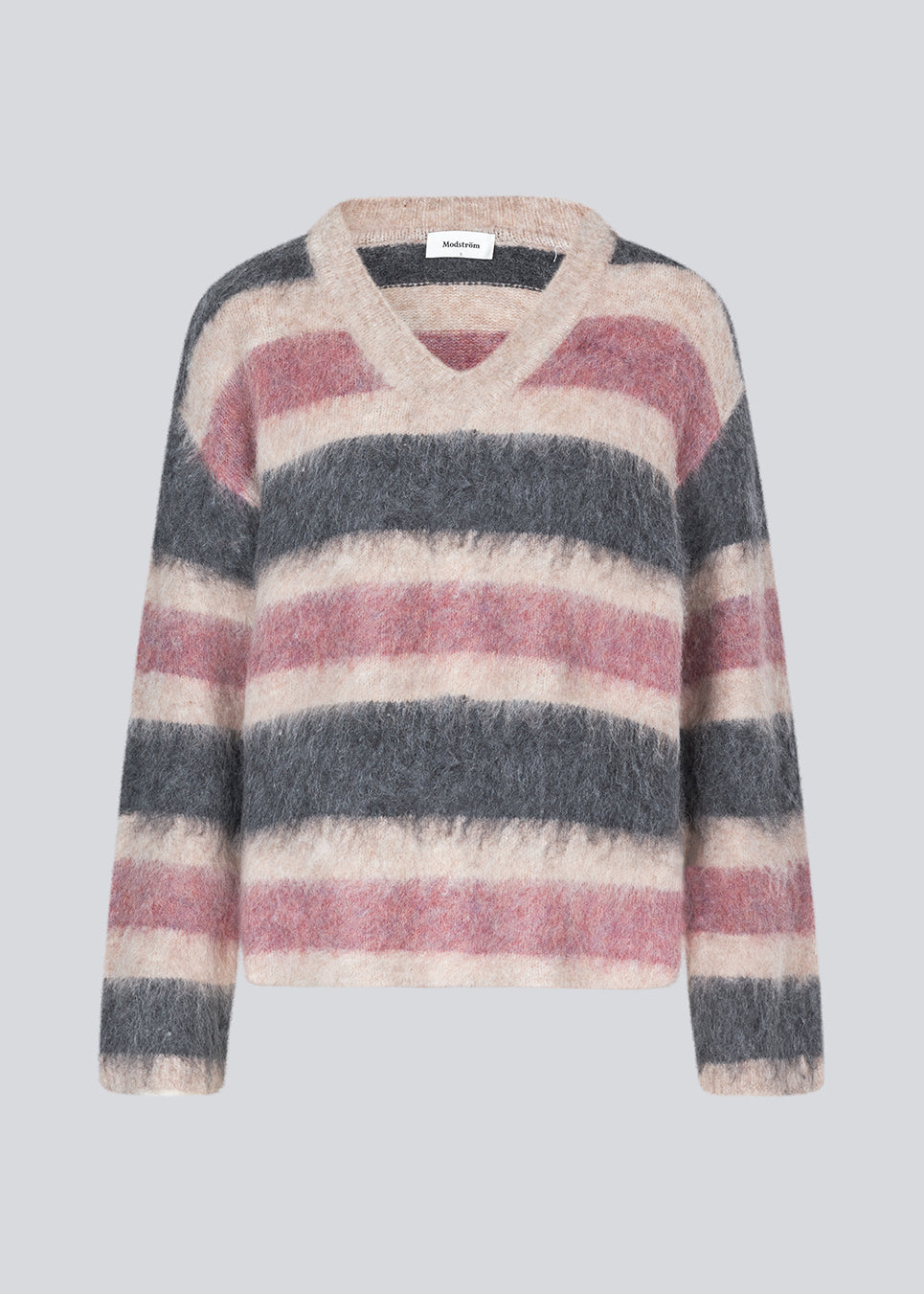 Blød stribet strik med v-udskæring. KaneMD v-neck har en løs pasform og lav skuldersøm.