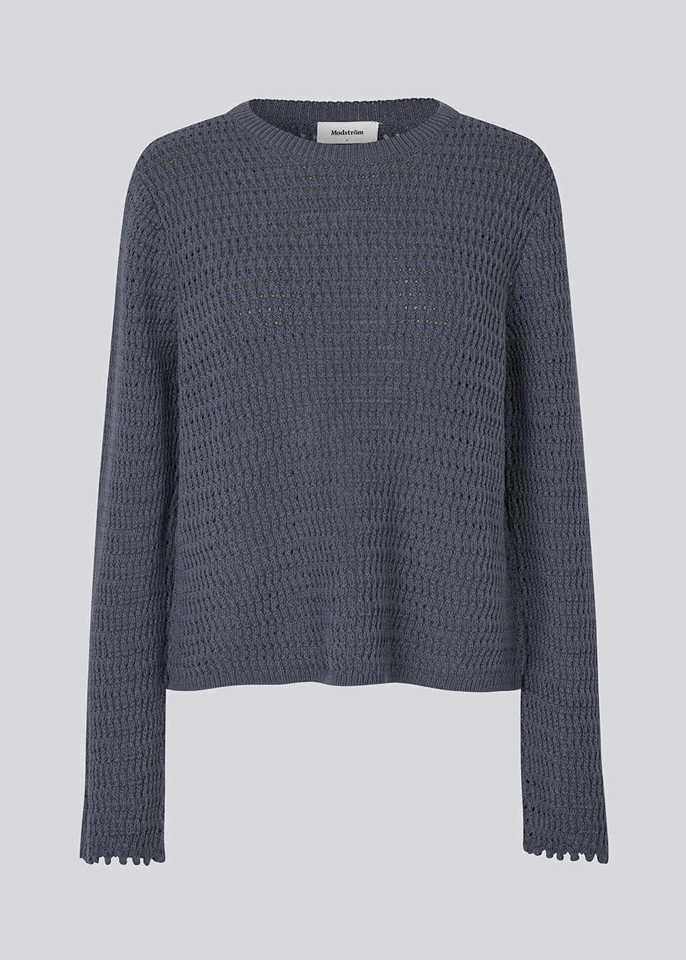 Hæklet langærmet bluse/trøje i mørkeblå i økologisk bomuld. MieMD top har detaljerede kanter og lange brede ærmer.