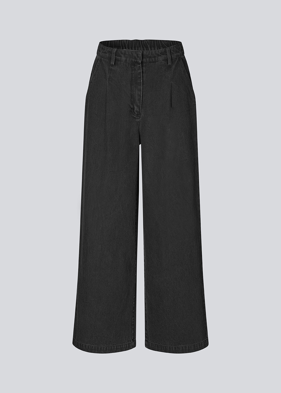 Habitbukser i denim med vide ben. MinniMD pants har en mellemhøj talje, lynlåsgylp og læg foroven, samt sidelommer og paspolerede baglommer.