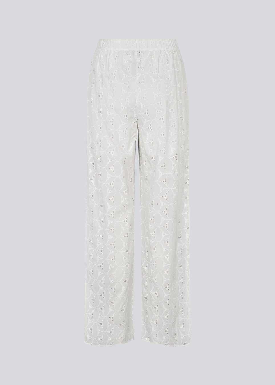 Hvide bukser med vide ben i broderie angalise. NanetteMD pants har en elastisk talje og foer.