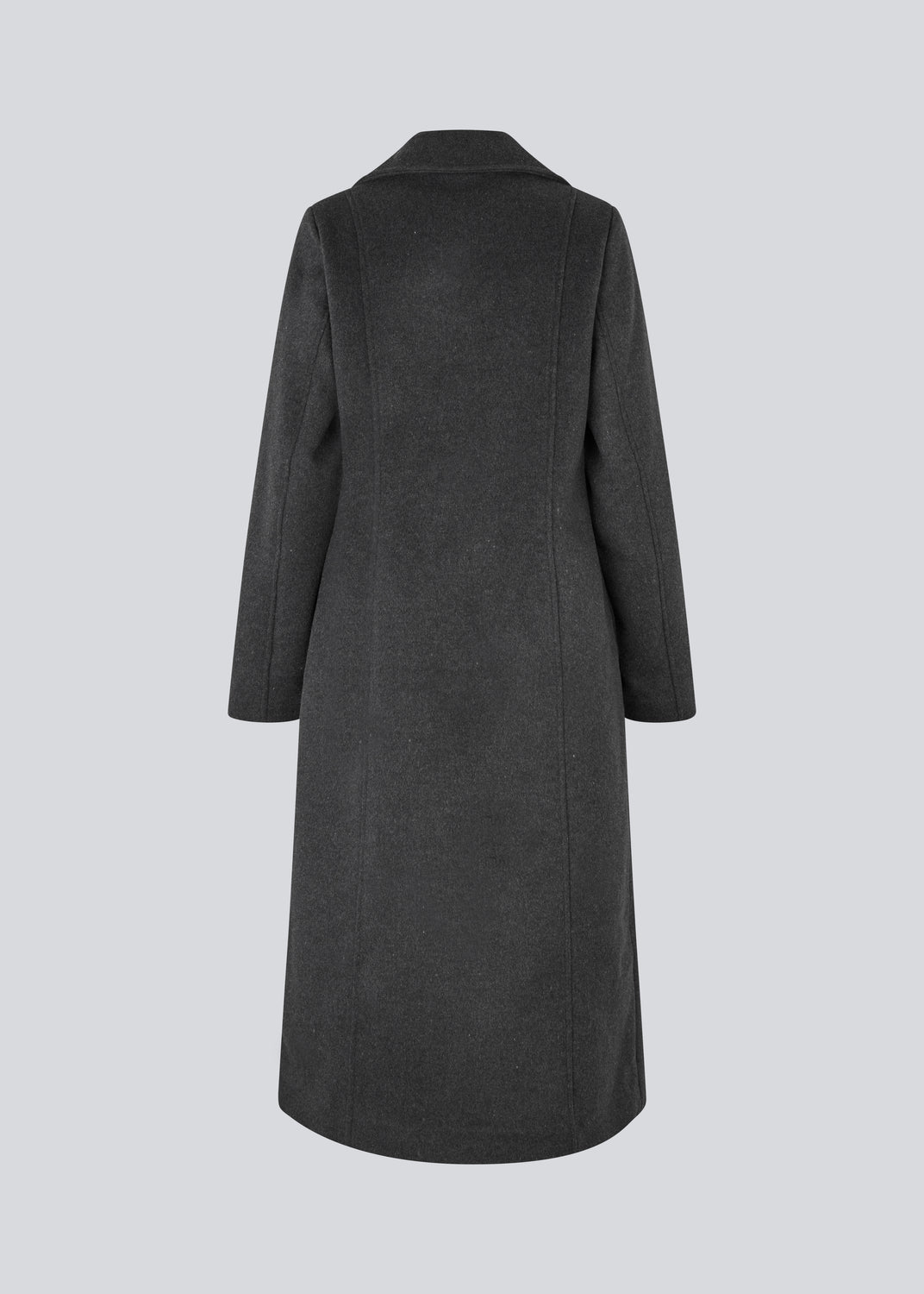 Klassisk, dobbeltradet uldfrakke med krave og revers. Olinamd coat er let figursyet, har foer og en slids bagpå. Modellen er 175 cm og har en str. s/36 på.
