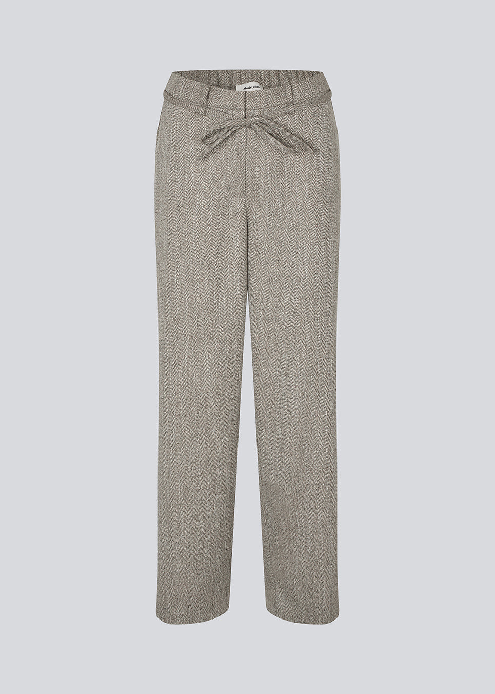 Bukser med lige ben og bindebånd i taljen. Popemd pants har en elastik i taljen og sidelommer. Modellen er 175 cm og har en str. S/36 på.