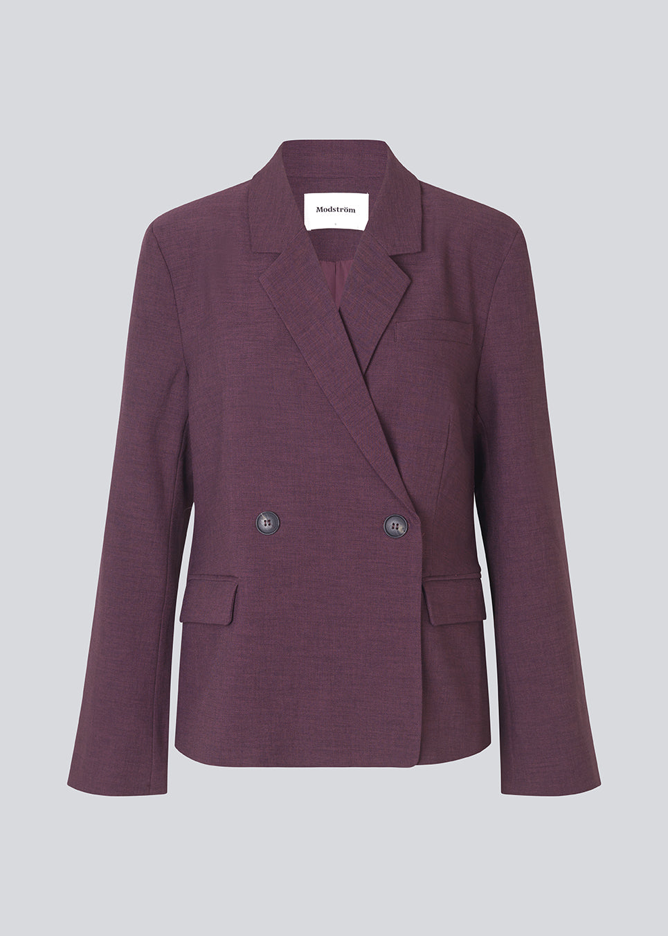 Lilla klassisk blazer med et elegant design. Ripleymd blazer har en reverskrave, to lommer fortil og en asymestisk knappelukning.