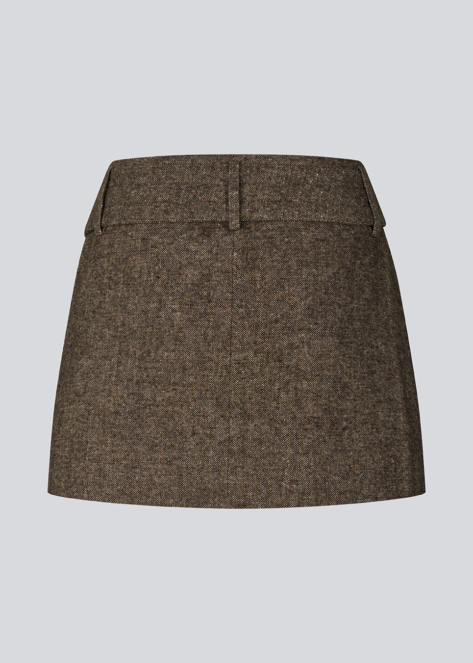 Miniskirt i uld. Rockymd skirt har et bredt bælte med et dekorativt bæltespænde, der giver den et cool og edgy udtyrk.