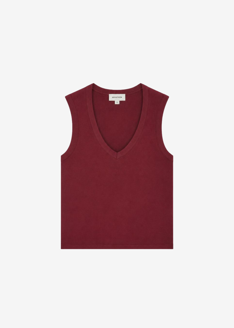 Tætsiddende ærmeløs top med dyb V-udskæring. Igormd v-neck top er skabt i ribbet økologisk bomuld med stretch. Brug den under en åben skjorte eller med bukser med vide ben.
