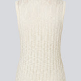 Ærmeløs top i gennemsigtigt strikmønster. AgnesMD Top har rund halsudskæring og er perfekt til lag-på-lag styling. En moderne og let top, der kombinerer elegance med alsidighed.