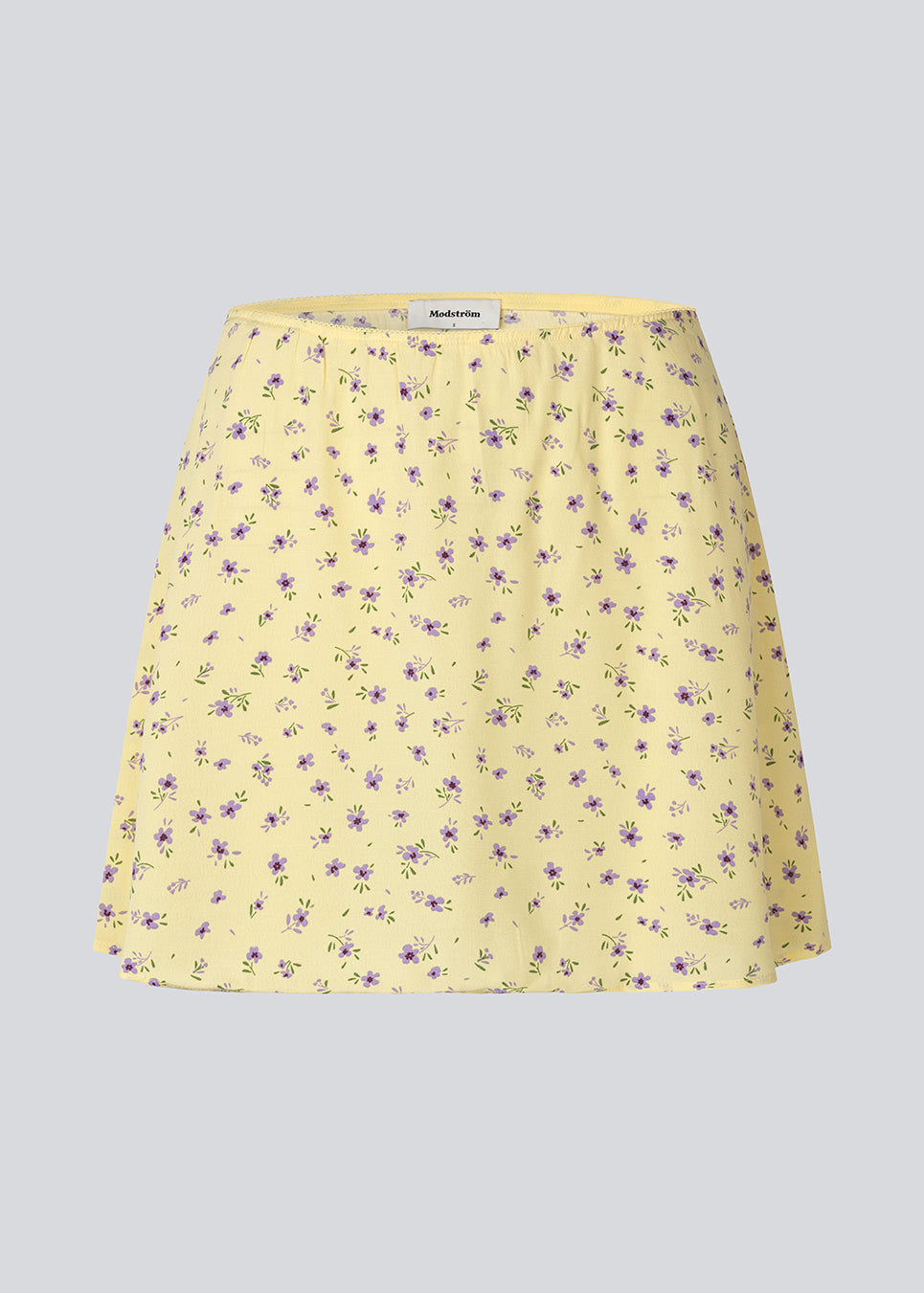 Mininederdel med blomsterprint. AlyssaMD Print Skirt er designet med elastikbånd og blondekant i taljen og har et let A-formet snit. En feminin og let nederdel, perfekt til sommerlige og elegante looks.