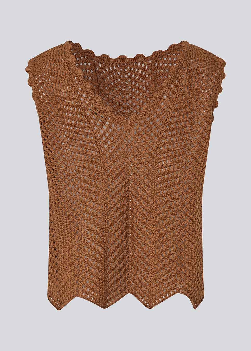 Hæklet top uden ærmer i multifarvet økologisk bomuld. CaryMD top har detaljerede kanter og en dyb v-udskæring på ryggen. 