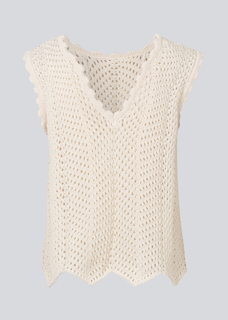 Hæklet top uden ærmer i multifarvet økologisk bomuld. CaryMD top har detaljerede kanter og en dyb v-udskæring på ryggen.