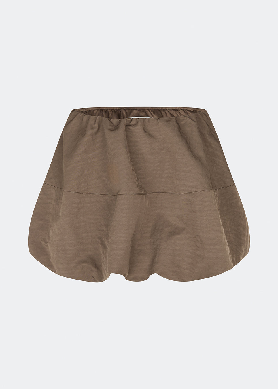 Voluminøs ballonnederdel med et moderne udtryk. Cirkelmd skirt er&nbsp;designet med en elastisk talje og en karakteristisk ballonform, der skaber en feminin og iøjnefaldende silhuet. En stilfuld statement-nederdel, der kan styles med alt fra en enkel T-shirt til en elegant top.