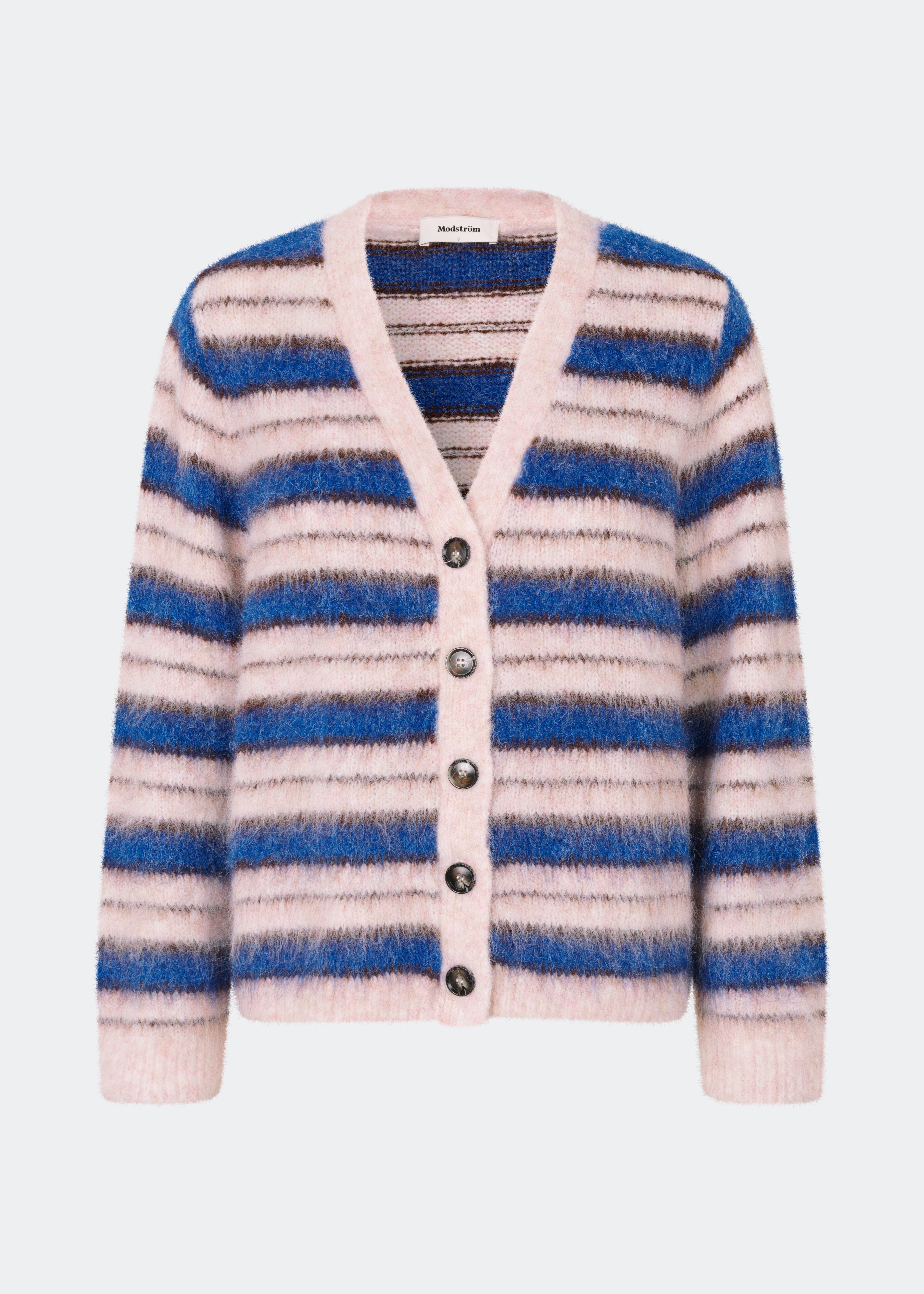 Ditlevmd Cardigan er en blød, stribet cardigan med en afslappet pasform og klassisk V-hals. De markante striber og de store knapper giver et moderne udtryk, mens den luftige strikkvalitet gør den ideel som et ekstra lag på kølige dage. Brug den over en T-shirt, skjorte eller kjole for et afslappet, men stilfuldt look.