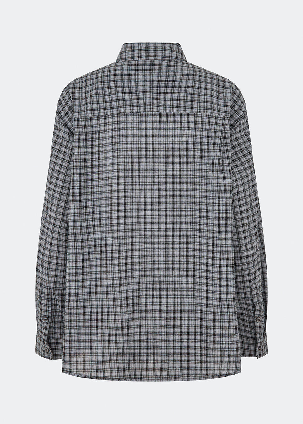 Klassisk skjorte med et tidløst ternet mønster. Dorotheamd shirt er designet i en afslappet, let oversized silhuet med klassisk krave, knaplukning og en brystlomme. De lange ærmer med manchetter fuldender det afslappede udtryk.