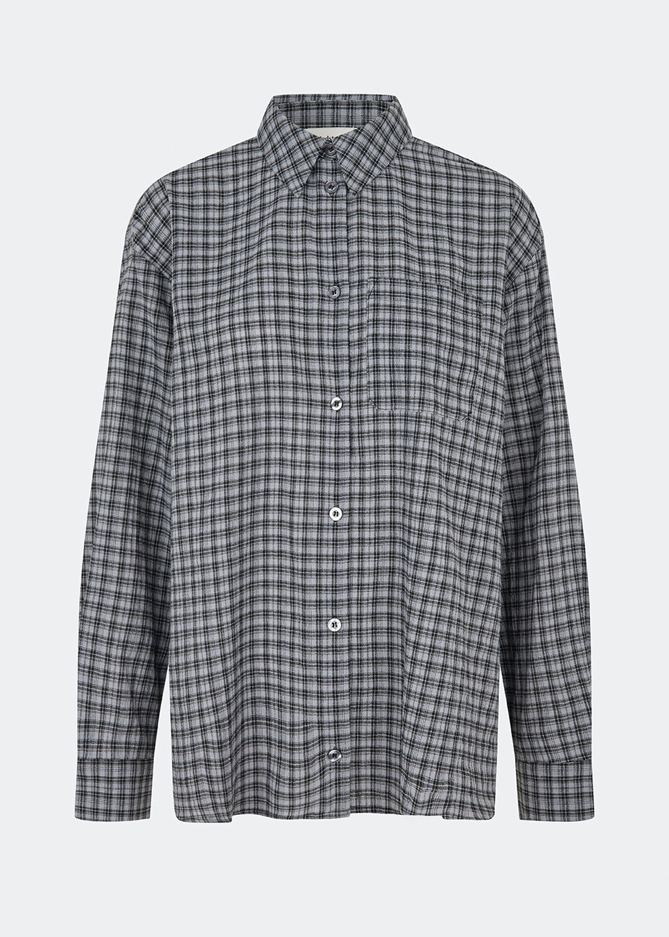 Klassisk skjorte med et tidløst ternet mønster. Dorotheamd shirt er designet i en afslappet, let oversized silhuet med klassisk krave, knaplukning og en brystlomme. De lange ærmer med manchetter fuldender det afslappede udtryk.