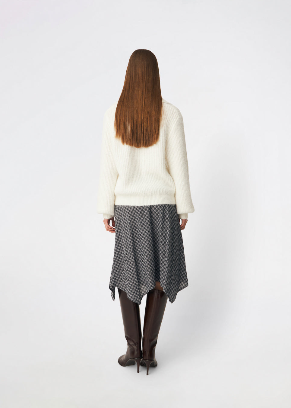 Klassisk nederdel med et tidløst ternet mønster. Dorotheamd skirt er designet i en afslappet, let silhuet med en usynlig lynlås i siden En alsidig garderobefavorit, der både kan styles alene eller over jeans.