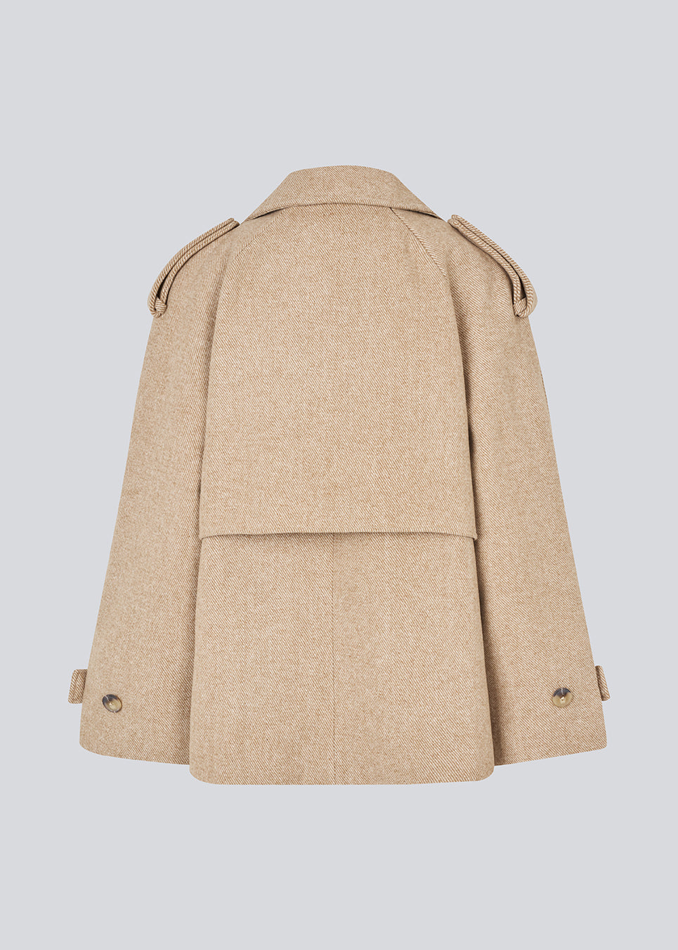 Dobbeltradet beige uldfrakke med skjulteknapper. EsmundMD jacket har klassiske frakke detaljer med raglanærmer og bredt bærestykke på ryggen.