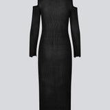 Ribstrikket kjole i et let strikket materiale. FajtelMD dress er knælang og har lange ærmer med cutouts på skuldrene. Modellen er 175 cm og har en størrelse S/36 på.