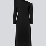Midi-kjole designet i kvalitet af EcoVero viskose. FanyaMD long dress har en normal facon med asymmetriske, lange ærmer med bar skulder, skæring i taljen og slids foran. Modellen er 175 cm og har en størrelse S/36 på.