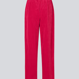 Pink fløjlsbukser med lange, brede ben og høj talje med lynlåsgylp og knap samt elastik bagpå. FikaMD pants er med foer. Modellen er 175 cm og har en størrelse S/36 på. er 175 cm og har en størrelse S/36 på.
