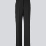 Gale pants har et klassisk design. Buksen har lige, vide ben med pressefolder som skaber et elegant udtryk. Indersøm (S/36): 83 cm Bukserne forlænges med 0,5 cm for hver størrelse. Style bukserne med en matchende blazer: Gale blazer eller GaleMD straight blazer i sort. 