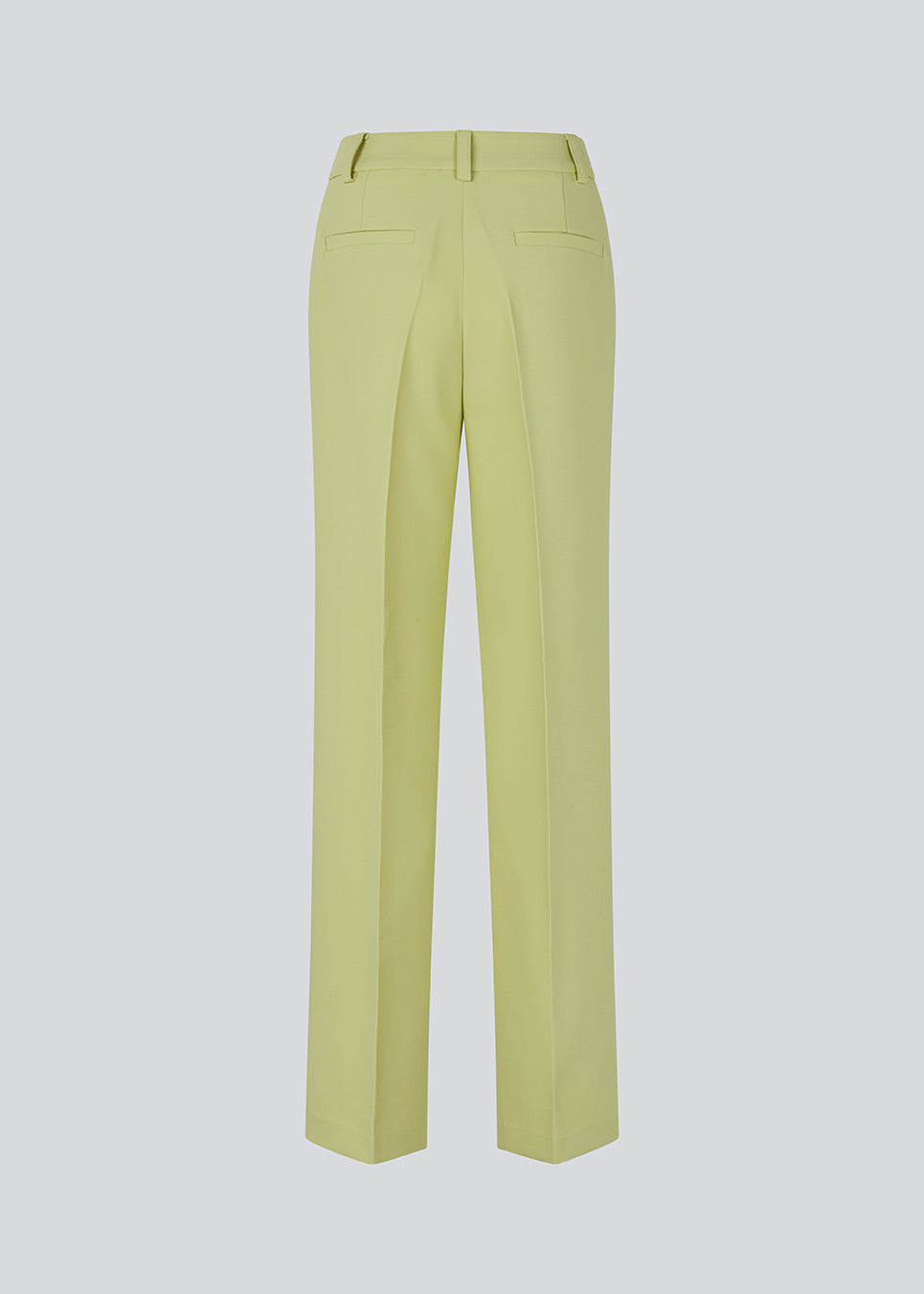 Gale pants i lys grøn/lime grøn har et klassisk design. Buksen har lige, vide ben med pressefolder som skaber et elegant udtryk.