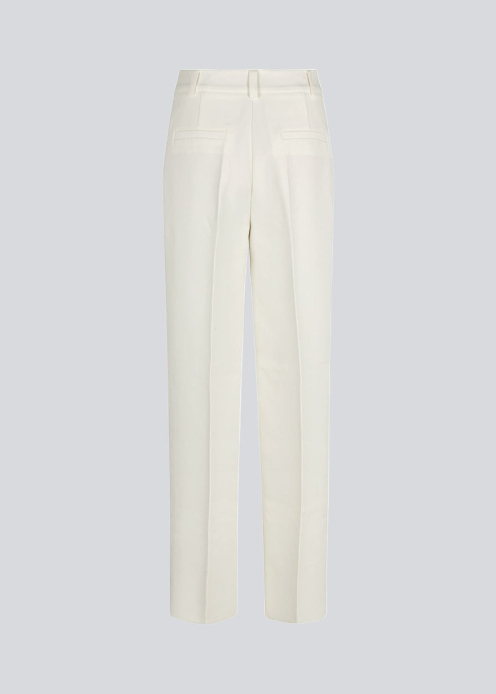 Gale pants i hvid har et klassisk design. Buksen har lige, vide ben med pressefolder som skaber et elegant udtryk. Modellen er 175 cm og har en størrelse S/36 på. Indersøm (S/36): 83 cm Bukserne forlænges med 0,5 cm for hver størrelse.