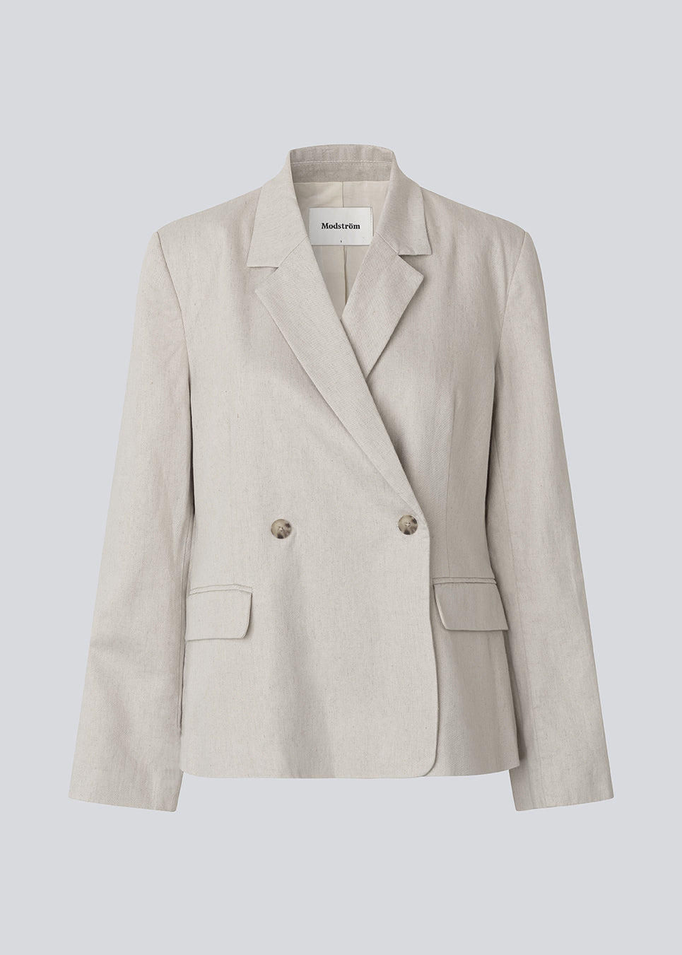 Klassisk dobbeltradet blazer i hør. GaleMD Linen Loose Blazer har reverskrave, knappelukning og lommer. En let og elegant blazer, der kombinerer tidløst design med afslappet silhuet.