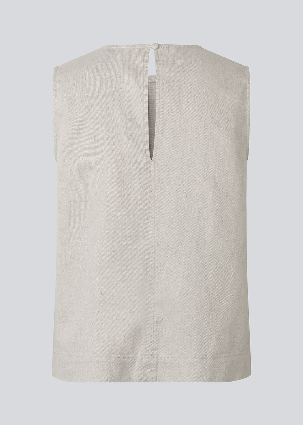 Ærmeløs top i hør. GaleMD Linen Top har rund halsudskæring og hæktelukning i nakken. En let og elegant top, perfekt til både afslappede og stilfulde sommerlooks.