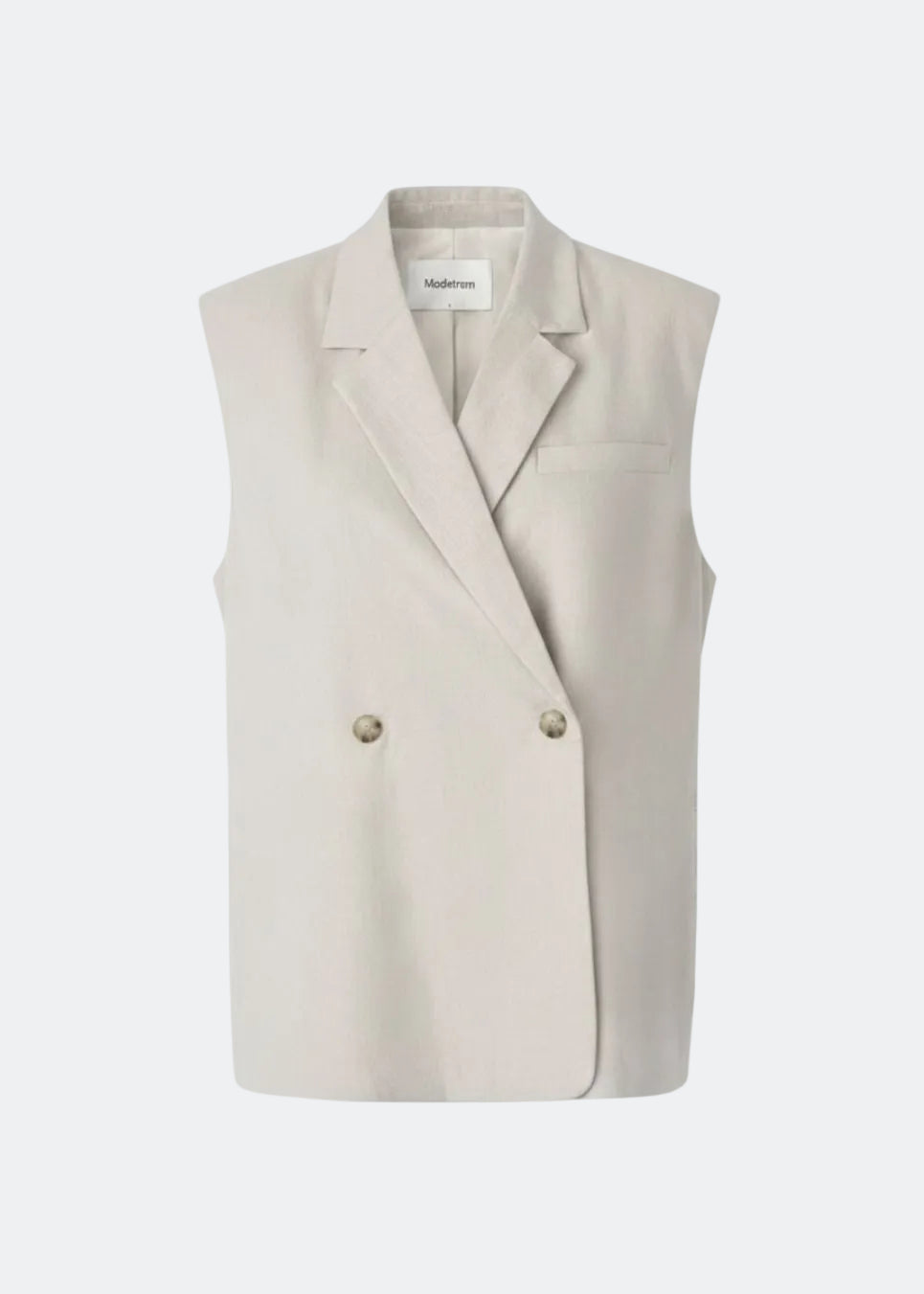 Vores klassiske Gale Vest i hør kvalitet. GaleMD linen vest har et løst fit, er ærmeløs og har knappelukning fortil. Et tidløst og elegant valg, der kombinerer lethed med moderne, afslappet silhuet.
