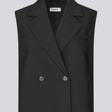 Løs vest med krave i vores klassiske gale materiale. Galemd vest er ærmeløs og har en knappelukning fortil. Modellen er 175 cm og har en str. S/36 på.