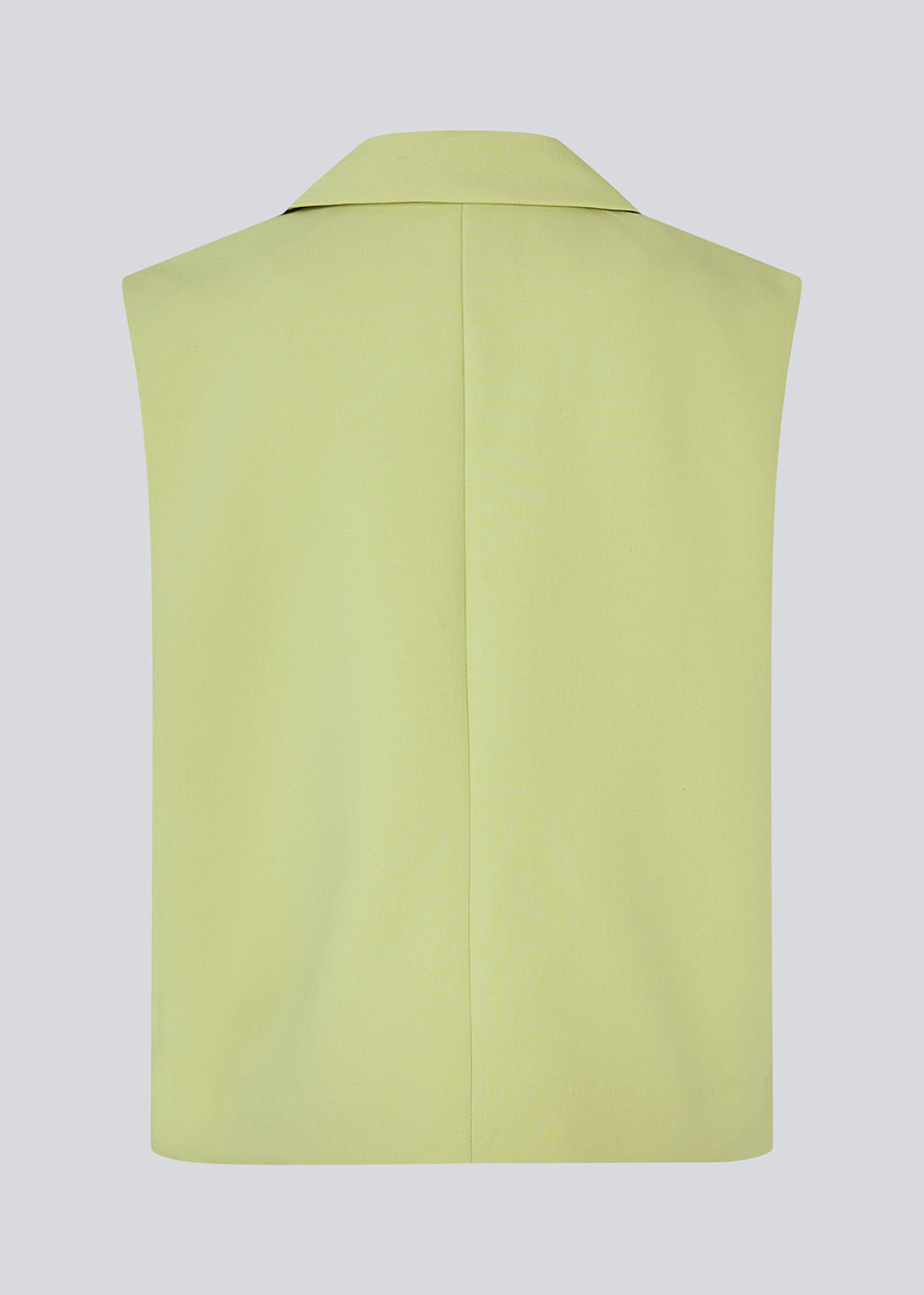 Løs vest i lys grøn/lime grøn med krave i vores klassiske gale materiale. Galemd vest er ærmeløs og har en knappelukning fortil.&nbsp;