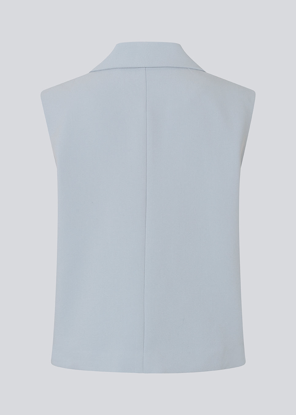 Løs vest med krave i vores klassiske gale materiale. Galemd vest er ærmeløs og har en knappelukning fortil. 