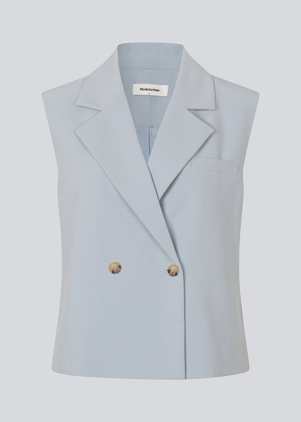 Løs vest med krave i vores klassiske gale materiale. Galemd vest er ærmeløs og har en knappelukning fortil. 