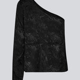Top i skinndende satin med mønster. GraceyMD top har en bar skulder og et langt, bredt ærme. Pasformen er løs. Modellen er 175 cm og har en størrelse S/36 på.