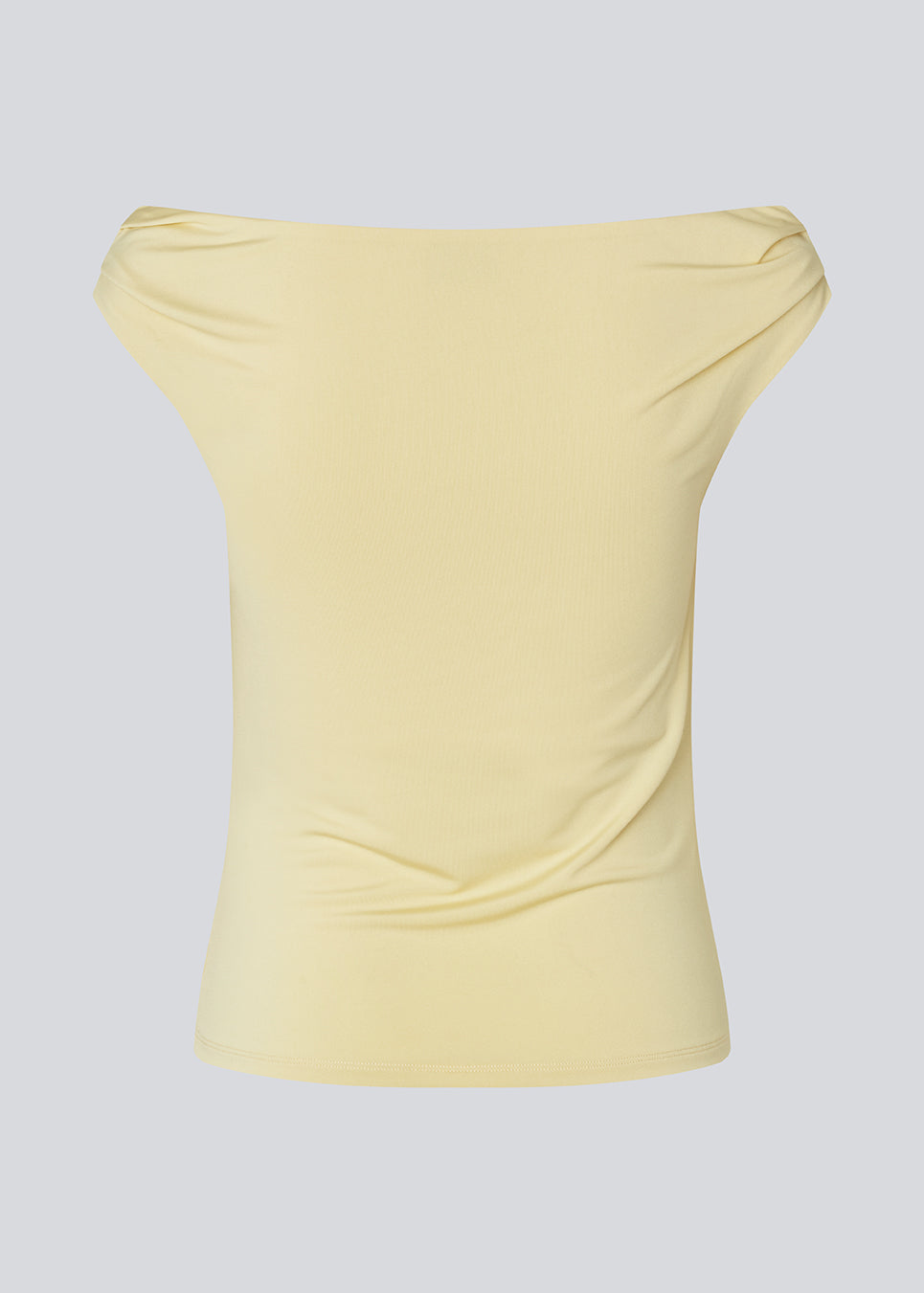 Off-shoulder top i et elastisk materiale. HimaMD off-shoulder top har en tætsiddende pasform og er let cropped.