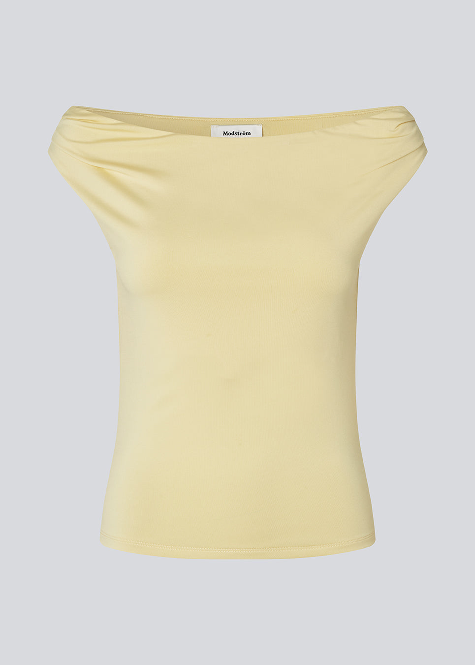 Off-shoulder top i et elastisk materiale. HimaMD off-shoulder top har en tætsiddende pasform og er let cropped.