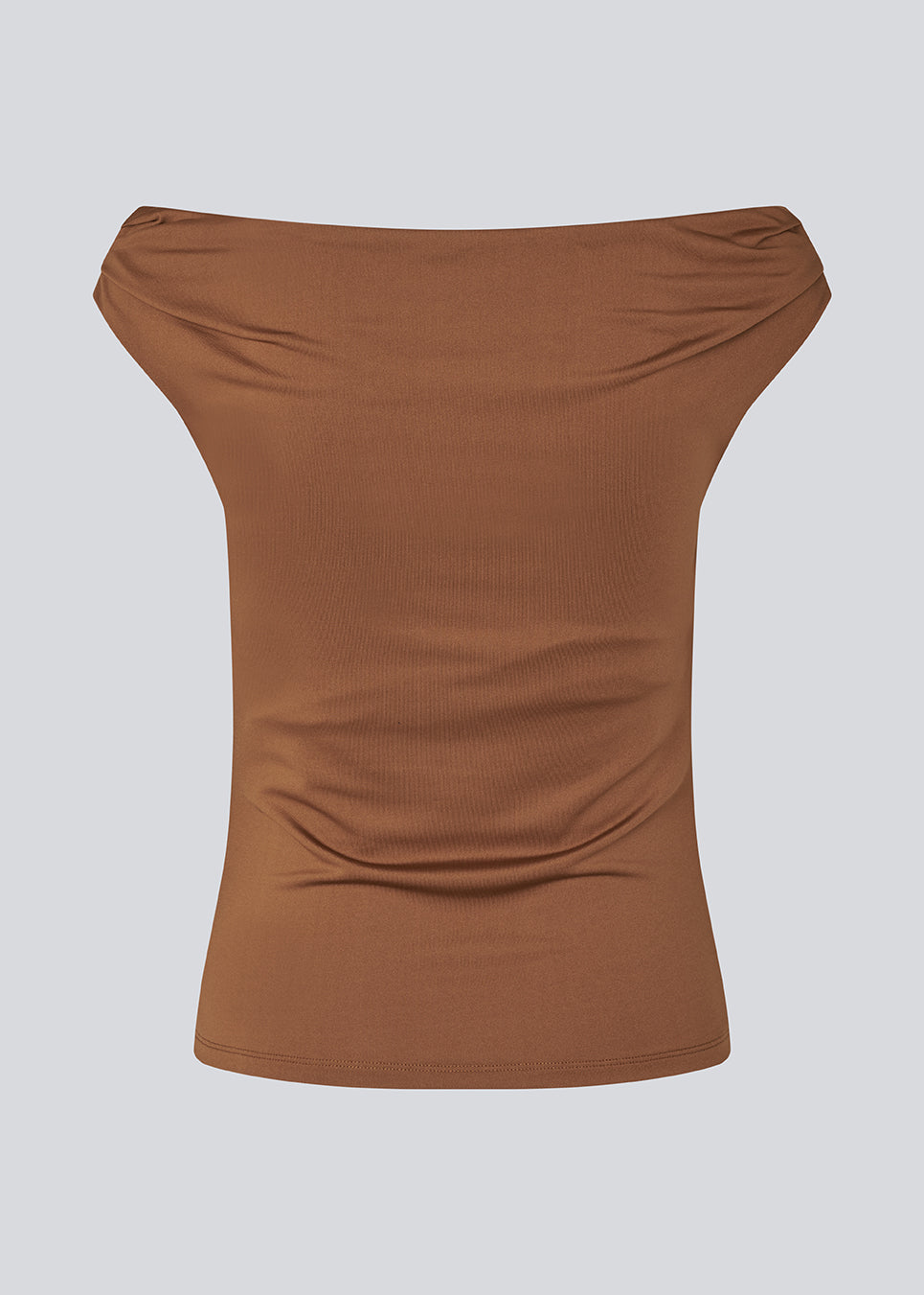 Off-shoulder top i et elastisk materiale. HimaMD off-shoulder top har en tætsiddende pasform og er let cropped.