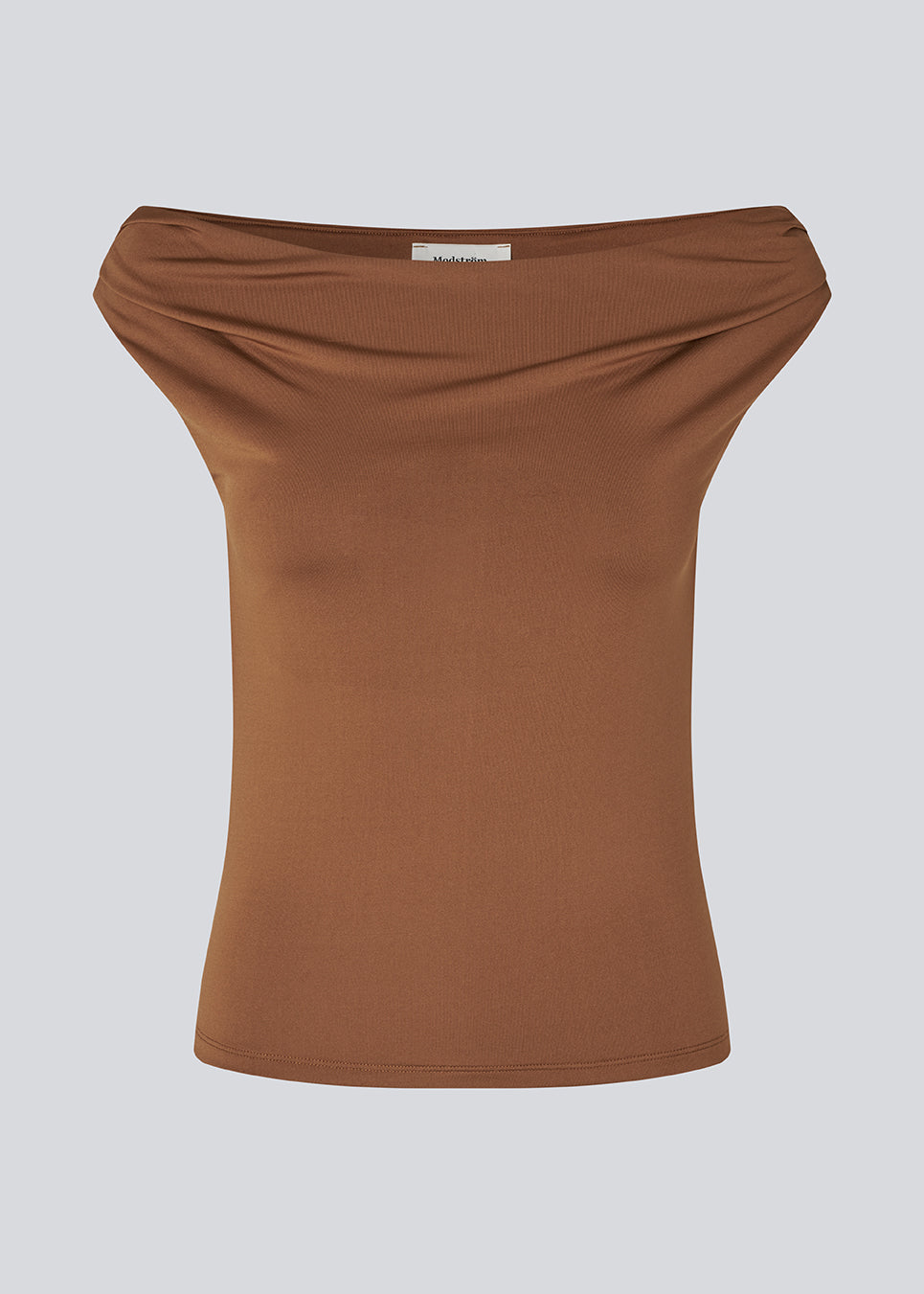 Off-shoulder top i et elastisk materiale. HimaMD off-shoulder top har en tætsiddende pasform og er let cropped.