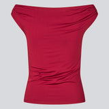 Off-shoulder top i et elastisk materiale. HimaMD off-shoulder top har en tætsiddende pasform og er let cropped.