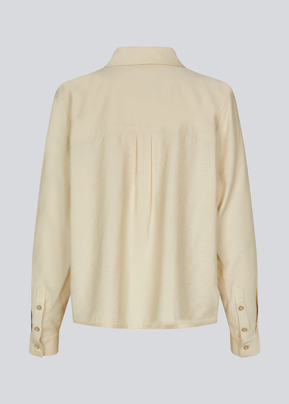 Skjorte i beige i en let EcoVero viskose med løs pasform. HudgesMD shirt har krave og knaplukning fortil og lange ærmer med manchet.&nbsp;