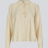 Skjorte i beige i en let EcoVero viskose med løs pasform. HudgesMD shirt har krave og knaplukning fortil og lange ærmer med manchet.&nbsp;