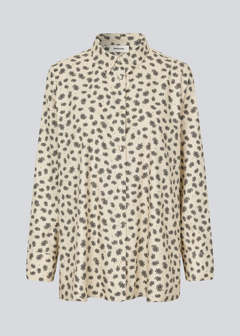 Oversize skjorte med krave og knaplukning fortil. IggaMD print shirt har brede ærmer med manchet og knappelukning.