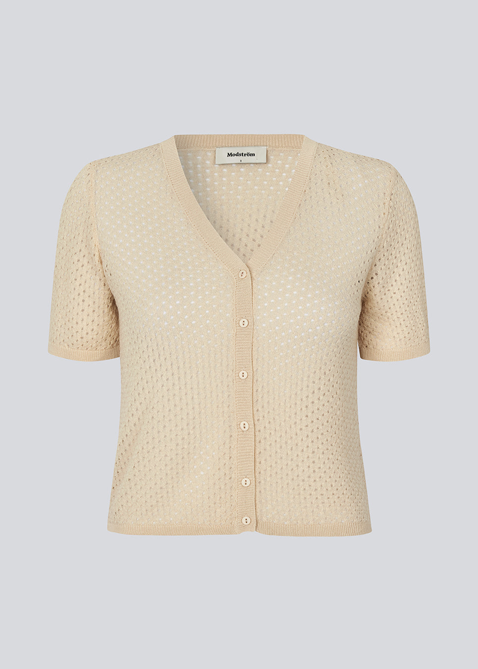 Strikket kortærmet cardigan i beige i løs pasform. IggyMD cardigan er i let gennemsigtigt materiale og har en V-udskæring samt ribkant.