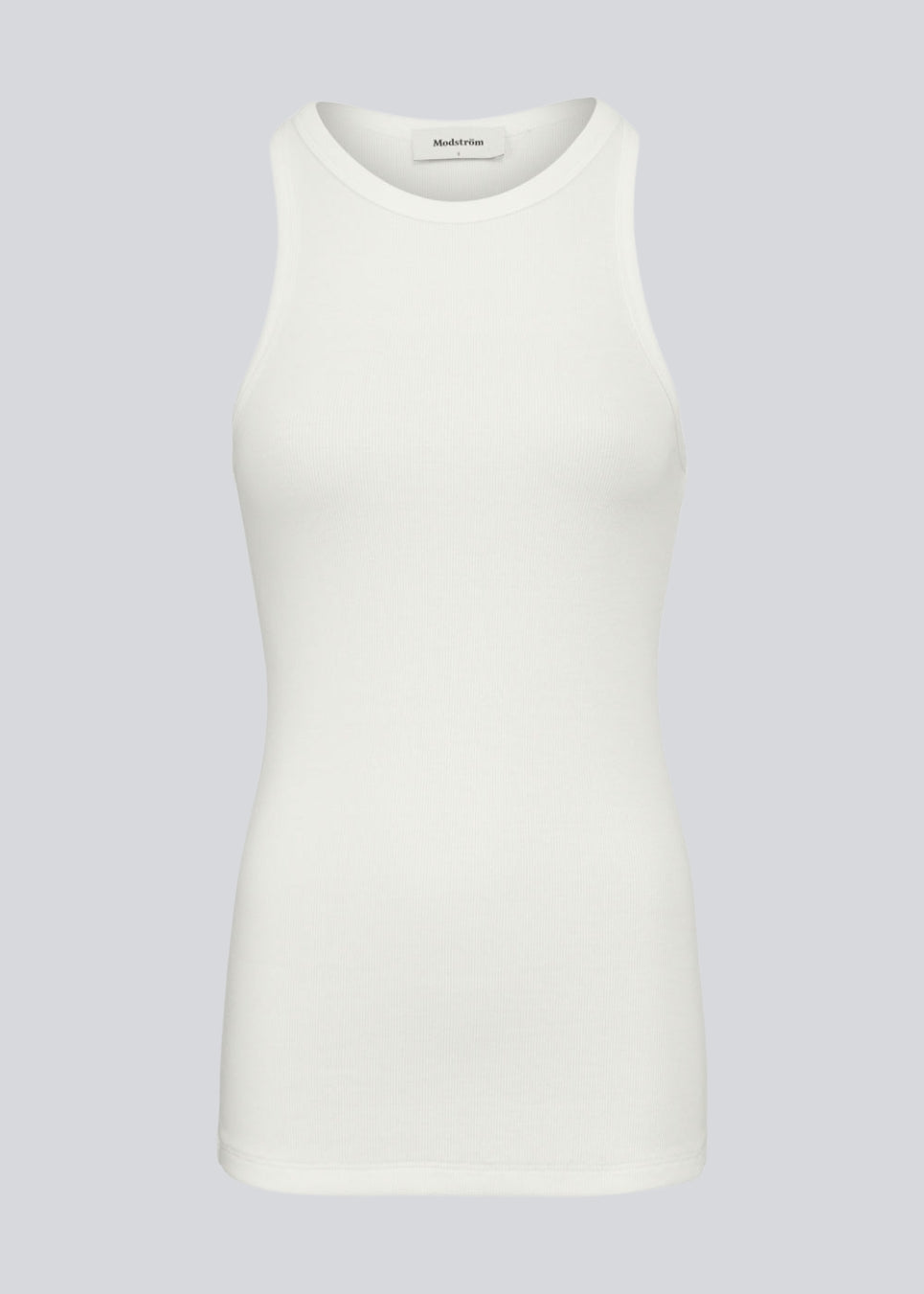 Lækker basic top i en blød bomuldsrib. Igor top har en tætsiddende pasform med bryderryg og er perfekt at style til et sporty look.