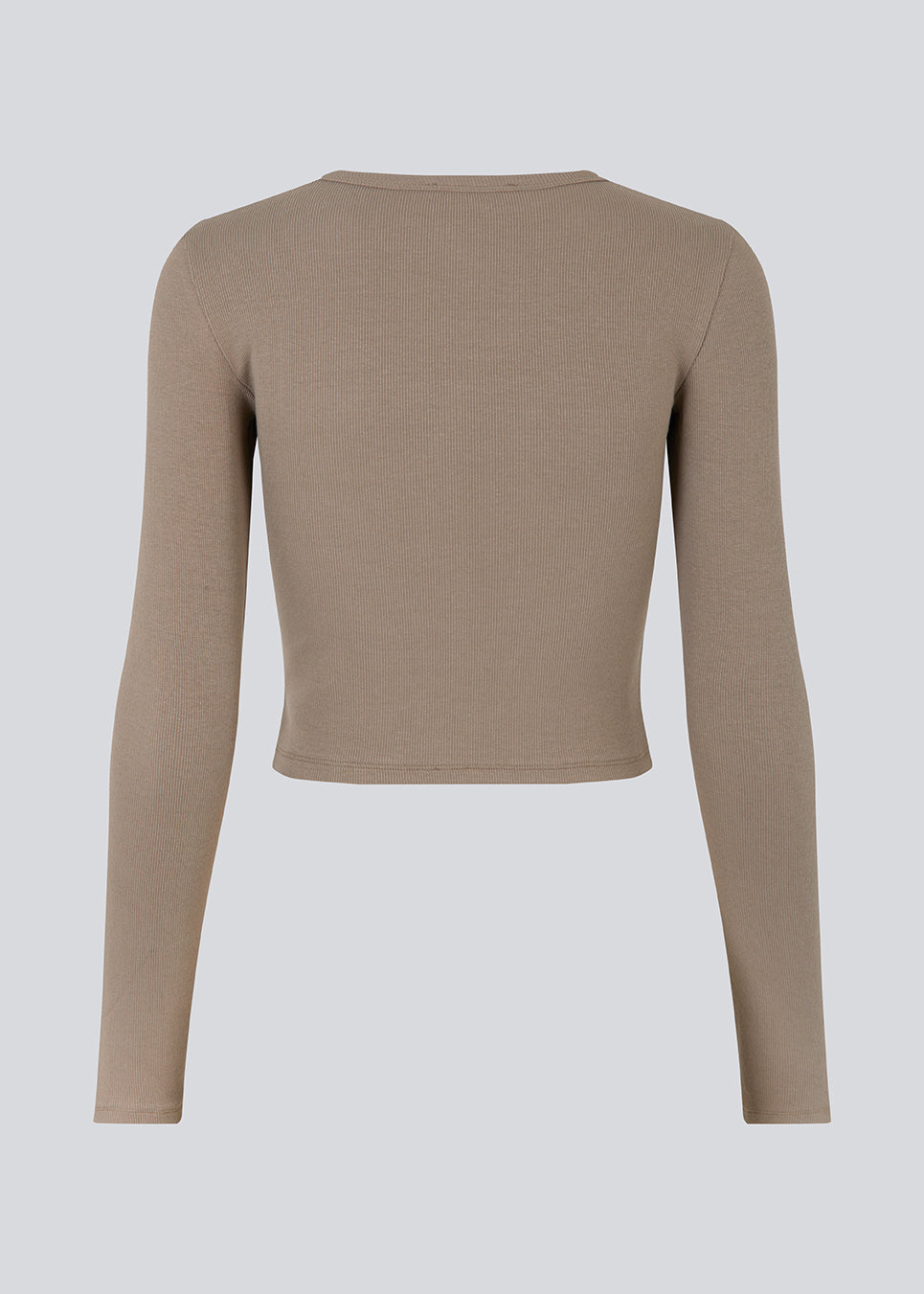 Lækker basic crop top i en blød bomuldsrib med stretch. IgorMD LS crop top har en tætsiddende, cropped pasform med lange ærmer. Modellen er 177 cm og har en størrelse S/36 på.