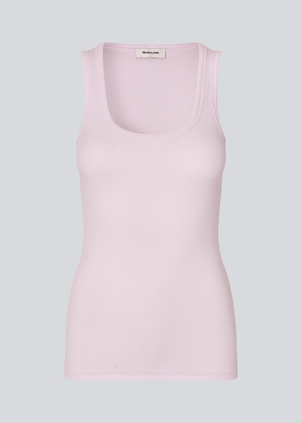 Ærmeløs top i ribbed bomuldsjersey. Igormd tank top har en tætsiddende pasform og en rund halsudskæring.